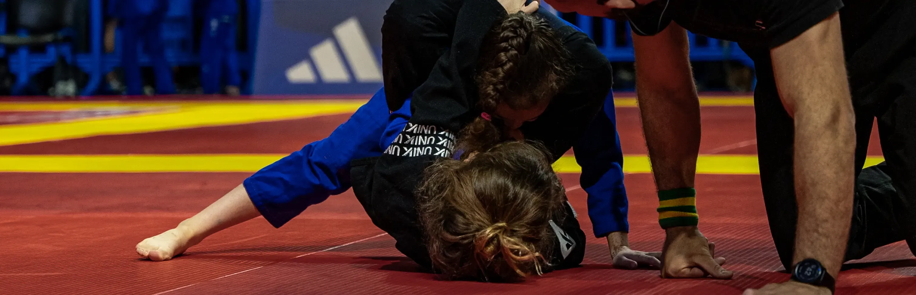 Un coach UNIK aux côtés d’une jeune compétitrice