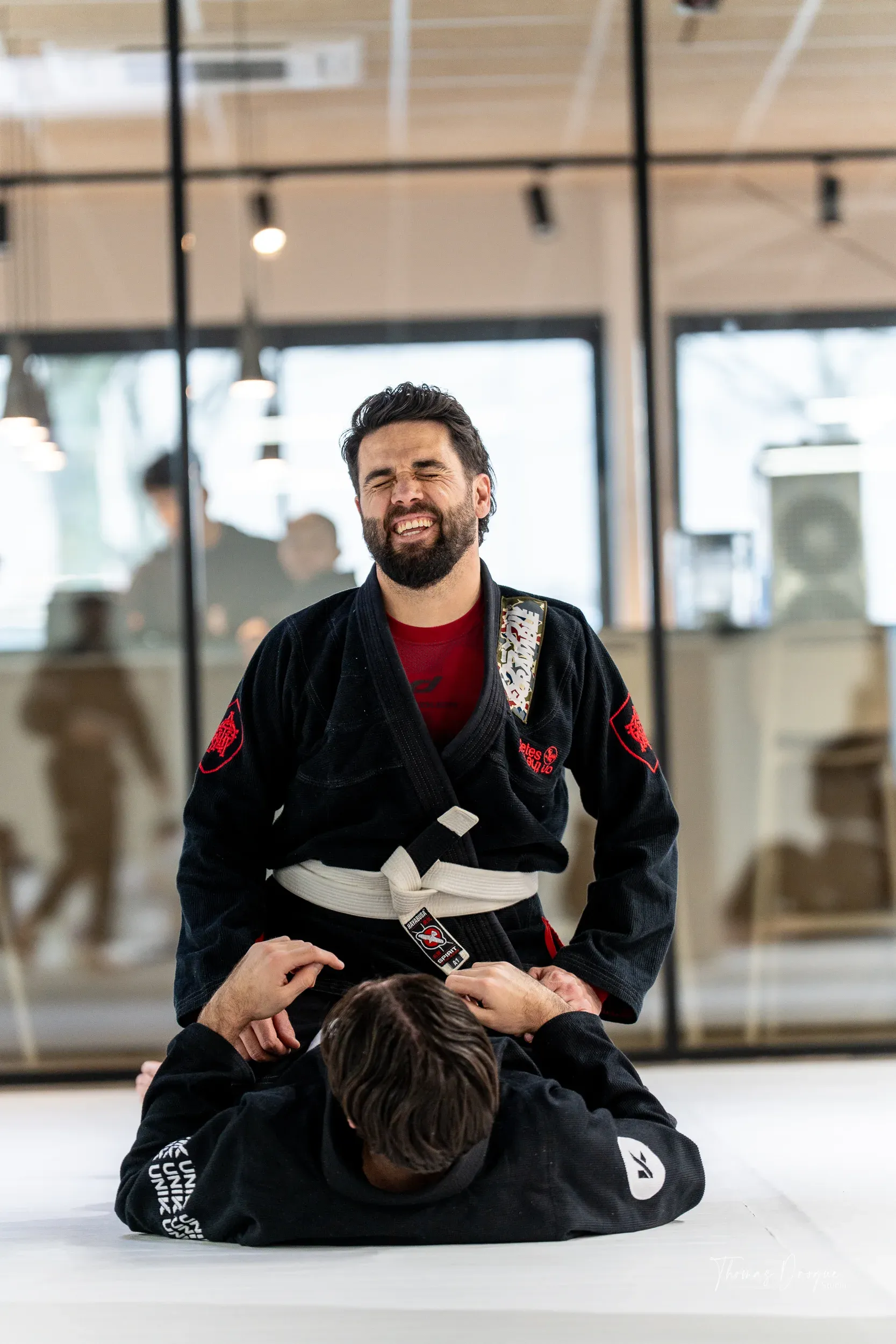 Un coach UNIK, ceinture noire, au dojo